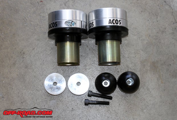 The Adjustable Coil Spacer kit from JKS (part #JKS2200) comes with all the parts necessary to provide an additional 1 1/2 up to 3 3/4 inches of additional lift for the front suspension. Rear suspension kits are also available.