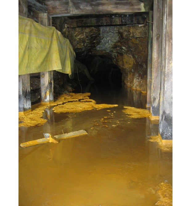 Many mines, this one just north of the Gold King, have mine water running out of them.  This mine only had standing water because it had been dammed up by... you guessed it... the EPA. Photo: Mireille Yanow, July 17, 2012.