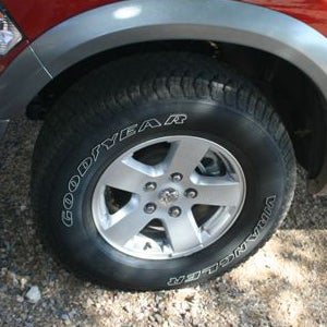 11.	Ram 1500s off-road capability is somewhat limited due in part to its non-aggressive street-type Goodyear Wrangler LT275/70R17 load range C tires.