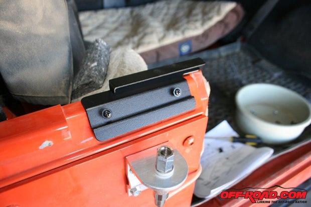 Follow Bestops instructions and drill four 1/8-inch holes where indicated. Secure the tailgate mounts with the supplied screws.