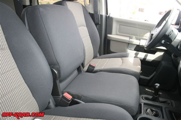 15.	If theres no regard for the passengers legs, securing the armrest in an upward position provides a third front seat.