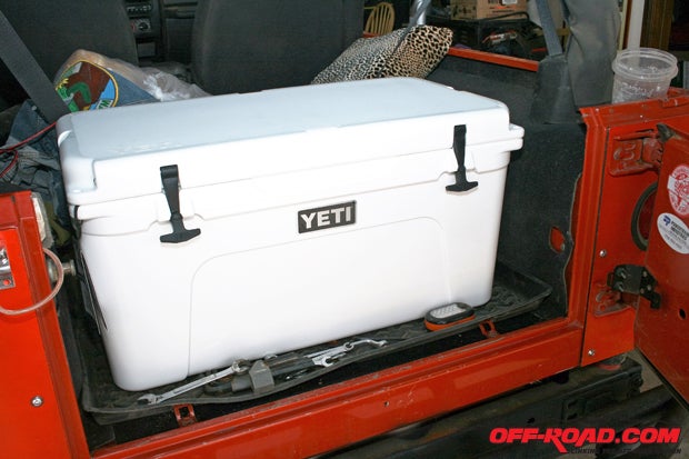A shade over three feet wide, the Yeti Tundra 110 cooler was designed with the off-road community in mind, and fits in the back of a Jeep like the Jeep was designed around it.