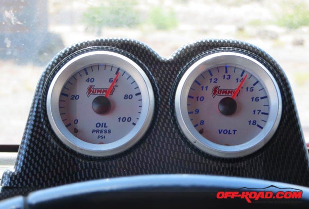 In place, the gauges clear the steering wheel without obscuring the trail for the driver. On the highway, a quick flick of the drivers eyes keeps the driver aware of the engines condition.