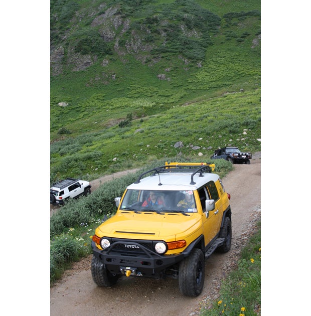 Nested within a crew of FJ and other Toyota-based froaders, we quickly rose above treeline and switchbacked up into the first of several mountain plateaus.