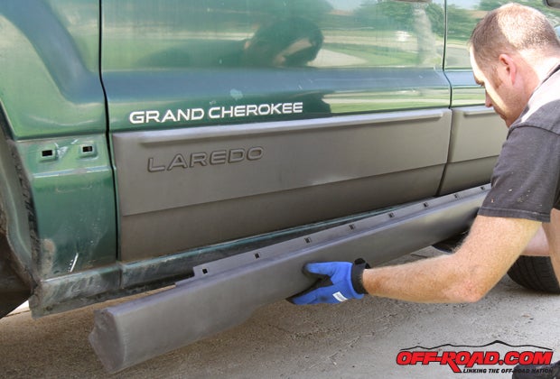 Next, the rocker panel needs to be removed. Using a pro tool or flat-head screwdriver, pull the retainers along the top of the panel.