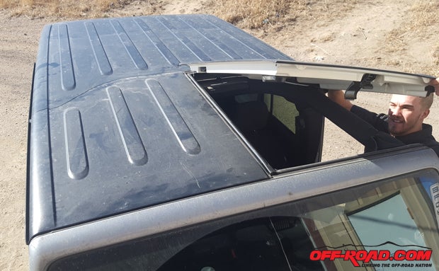 Remove the two front Freedom Top pieces for the three-piece stock Jeep hardtop.