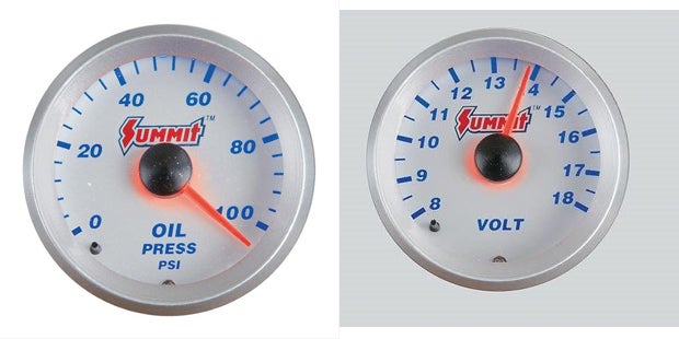 I like the Summit Racing logo on the silver oil pressure gauge (left, part no. sum-g2881) faceplate and the V6s oil pressure is quite good at higher RPM (as shown here).Both the silver voltmeter (right, part no. sum-g2880) and the oil pressure gauge have striking multi-colored lights without being distracting for nighttime running.