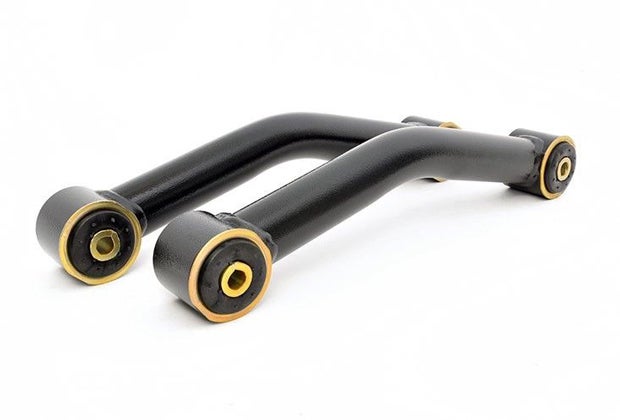 There are the heavy-duty lower control arms with Clevite bushings included in the kit.