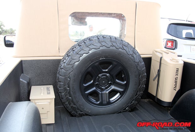A full-sized spare tire sits out back, along with military fuel cans to help complete the look.