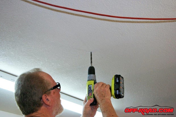 Mike used an electronic stud finder but the drywall thickness and heavy insulation thwarted its efforts, so we used the old-fashioned waydrill and hope!