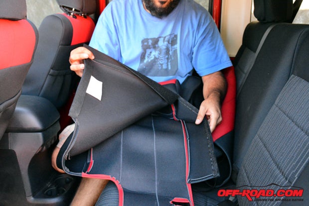 Wide Velcro strips and heavy-duty zippers are used to secure the CalTrend covers to the rear seat backs.