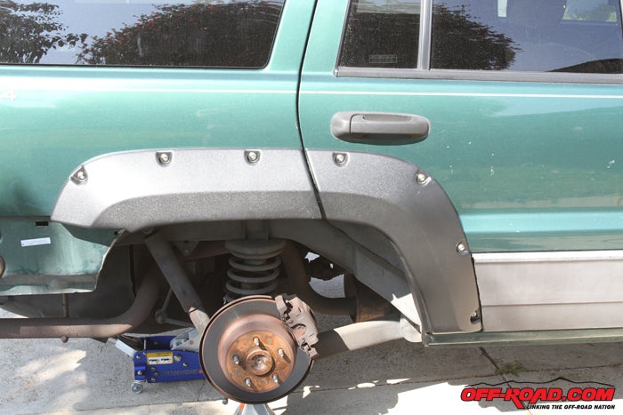 Back when our WJ was still green, we removed the stock rear bumper when we installed the Bushwacker Fender Flares. 