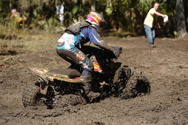 Muddy conditions challenged racers all day, but Chris Borich was able to made a last-lap pass to earn the win. 