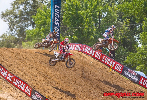 Ryan Dungey (right) leads Trey Canard (middle) and Ken Roczen (left) over a jump at Budds Creek. 