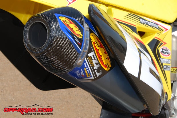 An FMF Racing Ti Megabomb header and 4.1 RCT Ti muffler with carbon-fiber cap help improve performance on our four-stroke-powered Suzuki.