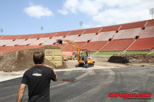 Robby Gordon eyes the large jump being built. 